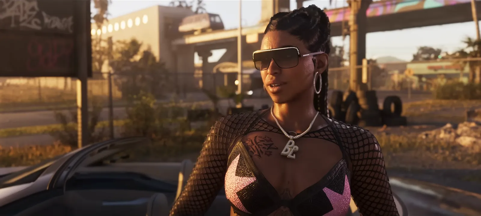 Vice City Metro Mule in GTA VI: Bae-Luxe in a convertible, with a Metro Mule people-mover train on its elevated guideway behind her.
