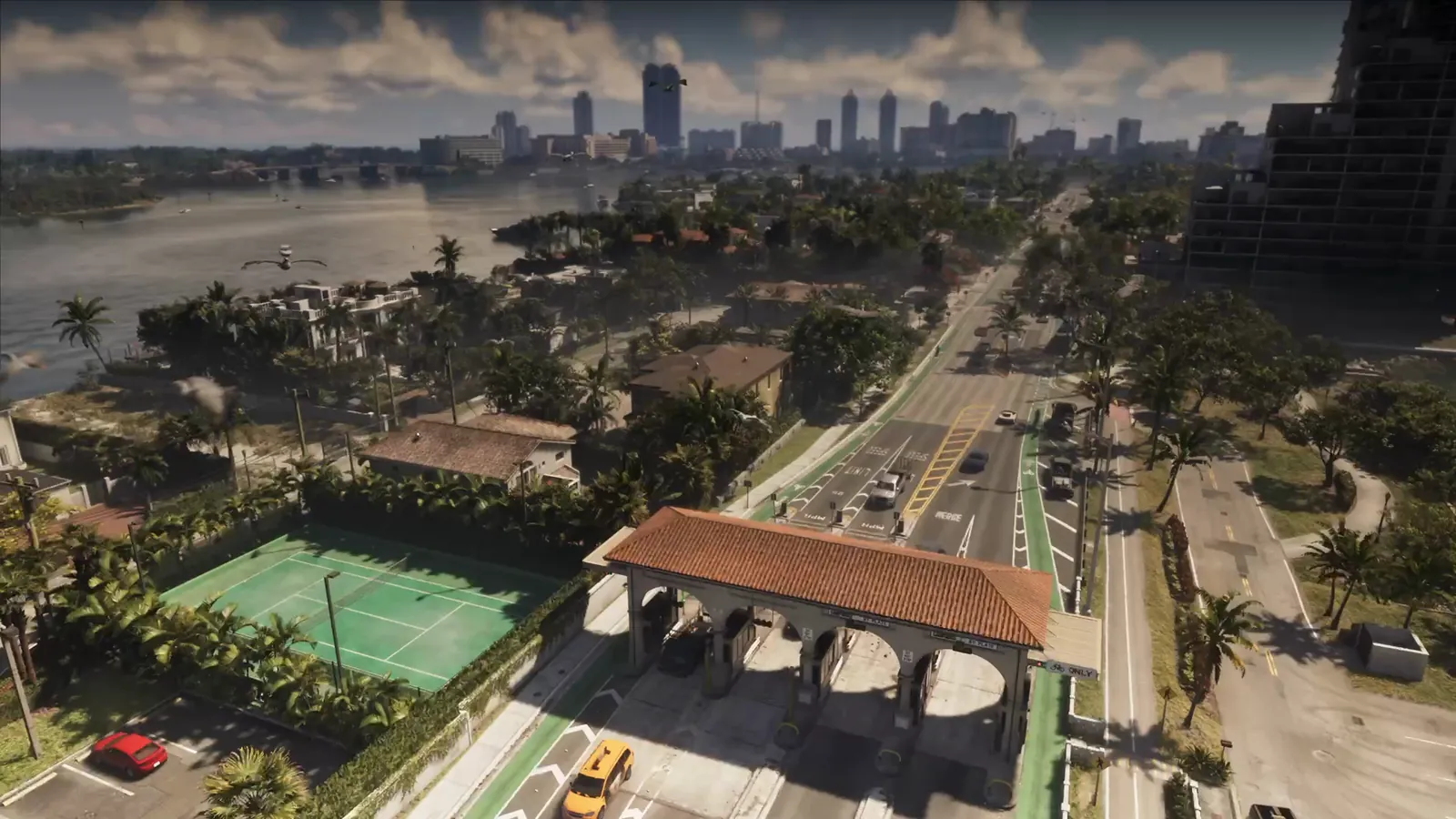 Rialto Islands in GTA VI: Aerial of the Rialto Islands causeway: a Mediterranean-style toll gatehouse, island homes and the downtown skyline across the bay.