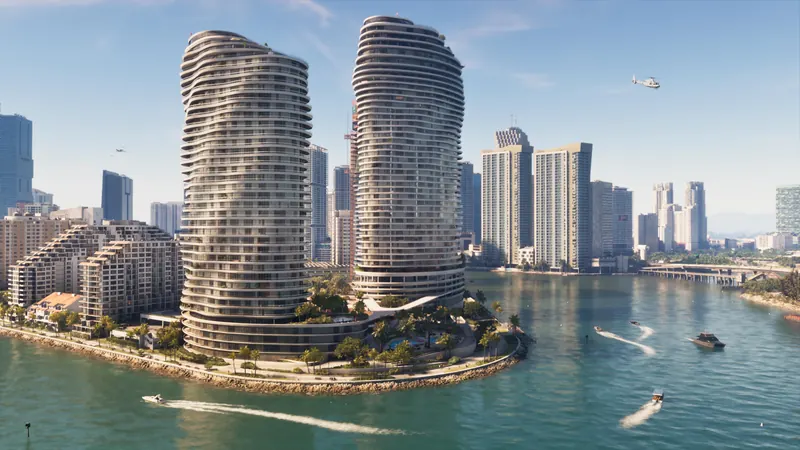Twin wavy-balcony residential towers on a bayfront point with boats and the downtown skyline behind.