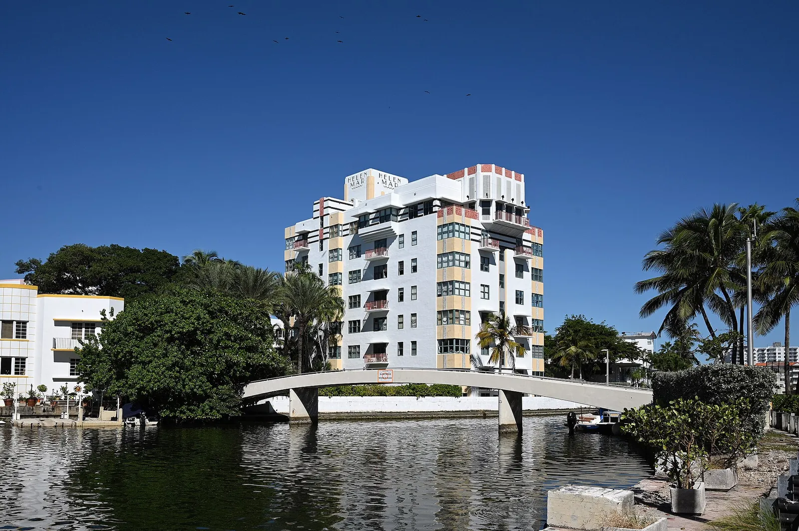 Helen Mar apartments, real-world photo: The Helen Mar across Lake Pancoast, 2025